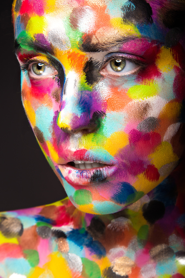 Girl with colored face painted Stock Photo 04