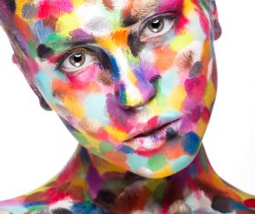 Girl with colored face painted Stock Photo 05