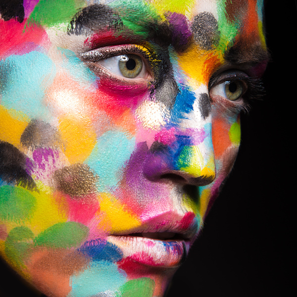 Girl with colored face painted Stock Photo 06