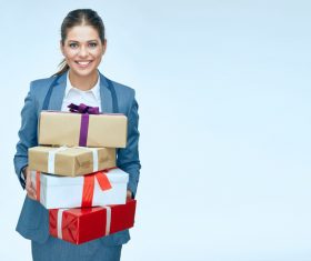 Happy business woman with gift boxes Stock Photo 02