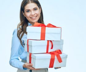 Happy business woman with gift boxes Stock Photo 12