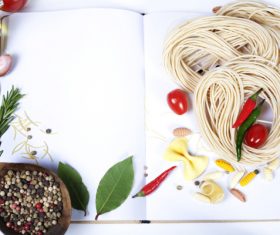 Italian Pasta with tomatoes, garlic, olive oil and pepper on a blanc notebook 03