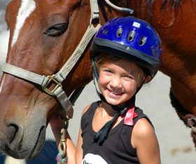 Little girl and horse Stock Photo