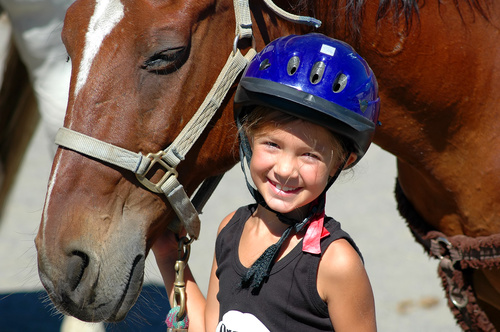 Little girl and horse Stock Photo