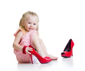 Little girl wearing high heels Stock Photo 01