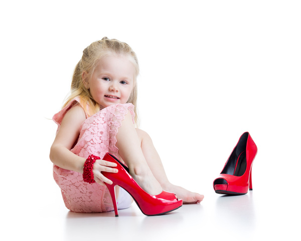 Little girl wearing high heels Stock Photo 01