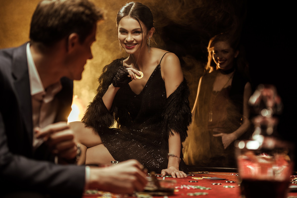 Man and woman in casino Stock Photo 03