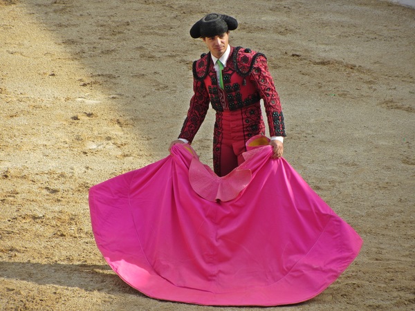Matador holding cloak Stock Photo