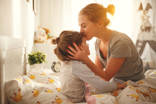 Mother calls her child to get up Stock Photo 02