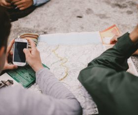 People gathering using smartphone Stock Photo