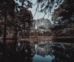 Reflection of natural park landscape on lake Stock Photo