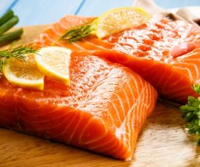 Salmon and spices on chopping board Stock Photo 01