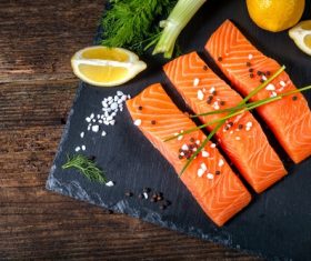 Salmon and spices on chopping board Stock Photo 02