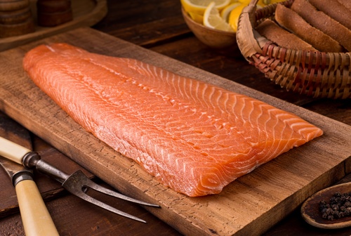 Salmon and spices on chopping board Stock Photo 03