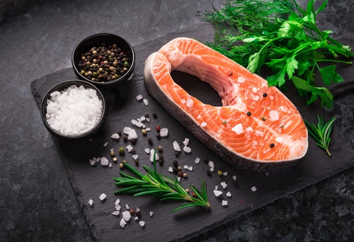 Salmon and spices on chopping board Stock Photo 04