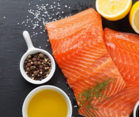 Salmon and spices on chopping board Stock Photo 05