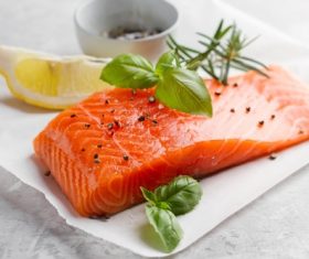 Salmon and spices on chopping board Stock Photo 06
