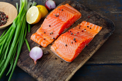Salmon and spices on chopping board Stock Photo 07