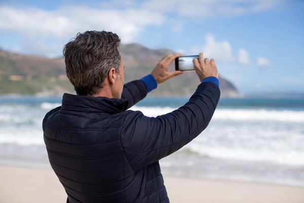 Shoot seascape with smart phone Stock Photo