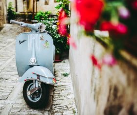 Small motorbike parked in the alley Stock Photo