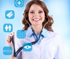 Smiling female doctor and medical service items Stock Photo