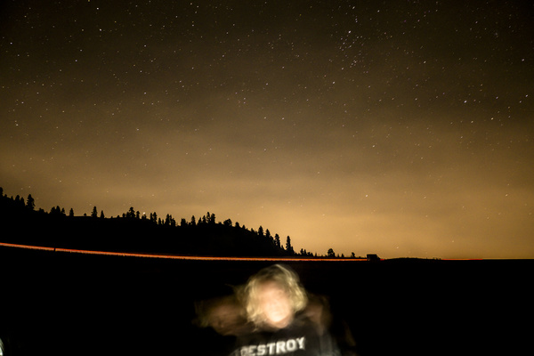 Stars sky on dark landscape Stock Photo