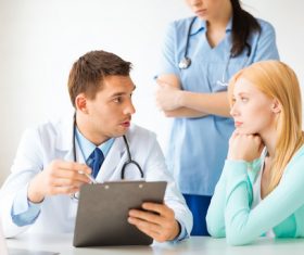 The doctor inquired about the condition Stock Photo 01