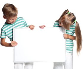 Two children holding drawing board Stock Photo
