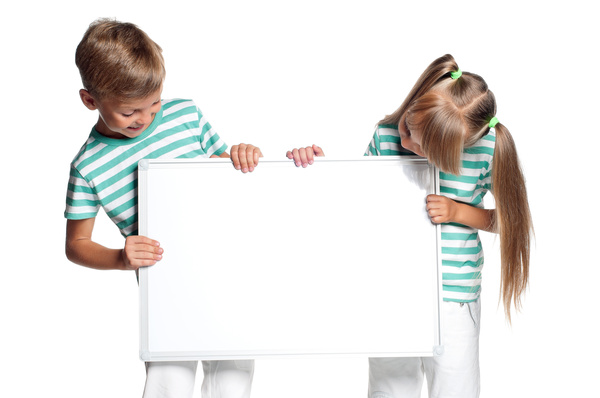 Two children holding drawing board Stock Photo