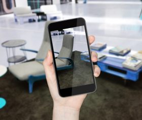 Using smartphone to take pictures Stock Photo