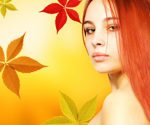 Woman and maple leaf background Stock Photo
