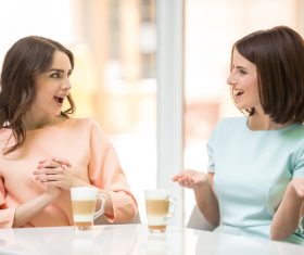 Woman chatting over coffee Stock Photo 01