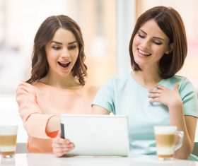 Woman chatting over coffee Stock Photo 02