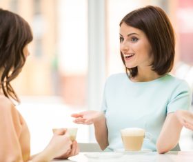 Woman chatting over coffee Stock Photo 04