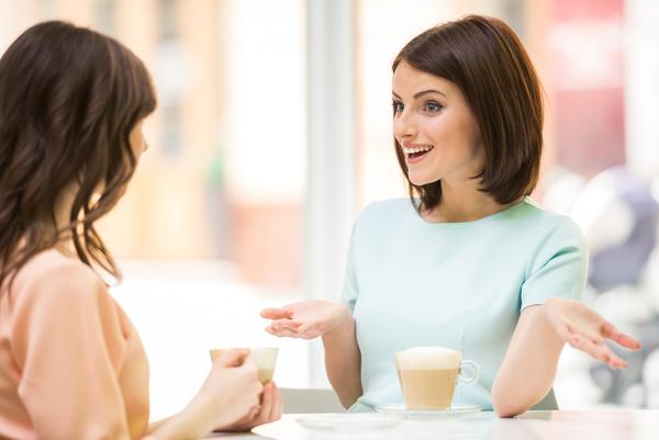 Woman chatting over coffee Stock Photo 04