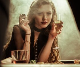 Woman holding bargaining chip in casino Stock Photo 01