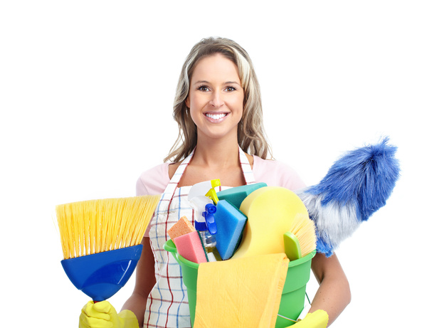 Woman holding cleaning supplies Stock Photo