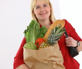 Woman holding food bag Stock Photo 06