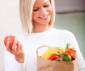 Woman holding food bag Stock Photo 07