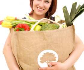 Woman holding food bag Stock Photo 08