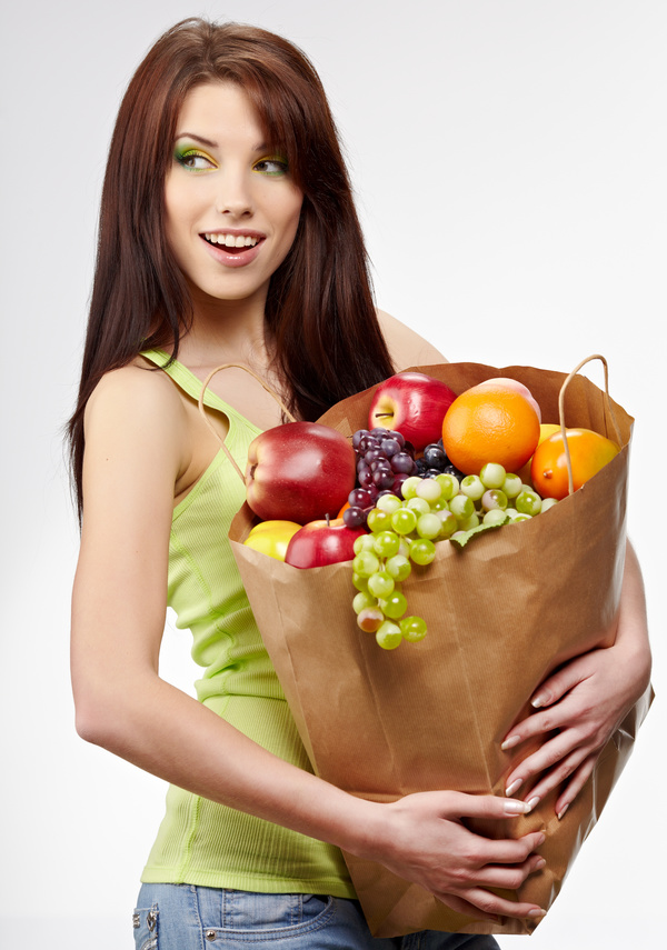 Woman holding food bag Stock Photo 10