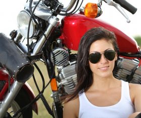 Woman sitting on motorcycle posing Stock Photo 07