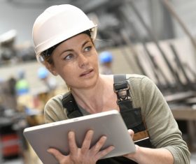 Woman using Tablet PC Stock Photo