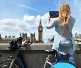 Woman using Tablet PC to take photos Stock Photo