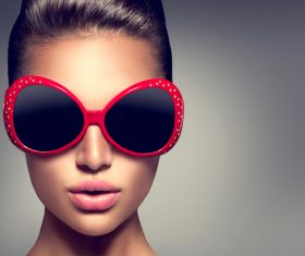 Woman wearing big sunglasses Stock Photo