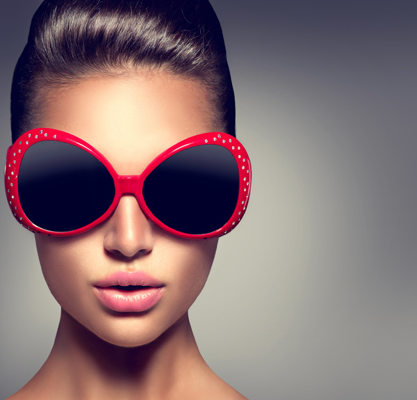 Woman wearing big sunglasses Stock Photo
