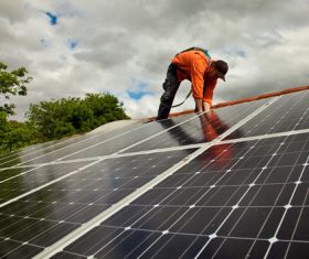 Workers Repair solar panels Stock Photo 01