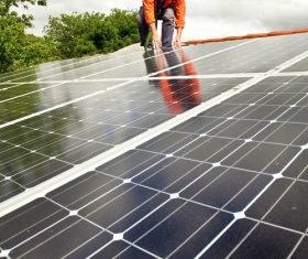 Workers Repair solar panels Stock Photo 02