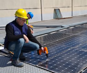 Workers Repair solar panels Stock Photo 04