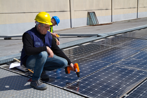 Workers Repair solar panels Stock Photo 04